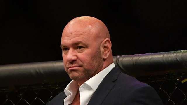 UFC CEO Dana White enters the Octagon following a fight.